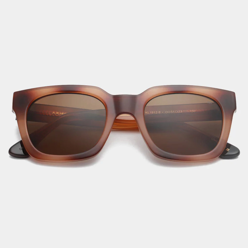 Brown square shape and medium-sized frame sunglasses.
A.KJAERBEDE Nancy Demi Brown Sunglasses - Jo And Co A.KJAERBEDE Nancy Demi Brown Sunglasses - A.KJAERBEDE