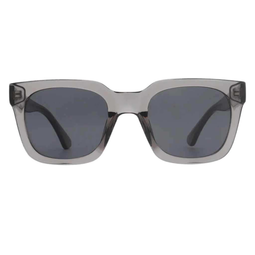 Grey transparent sunglasses with square shape and medium-sized frame.
A.KJAERBEDE Nancy Grey Transparent Sunglasses - Jo And Co A.KJAERBEDE Nancy Grey Transparent Sunglasses - A.KJAERBEDE