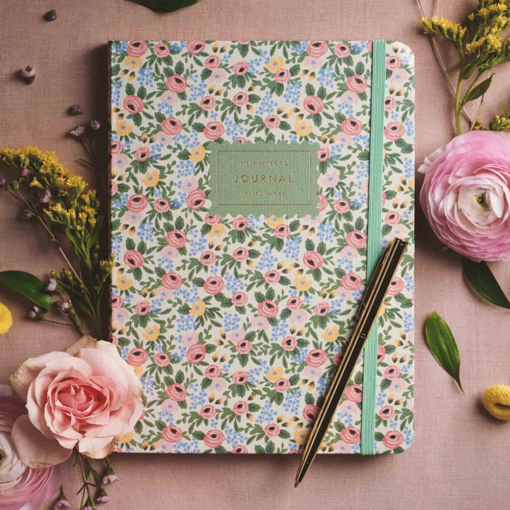 The Rosa Journal features a floral cover, elastic band and 144 pages with a gold pen with black ink.
Rifle Paper Co Rosa Journal With Pen - Jo And Co Rifle Paper Co Rosa Journal With Pen - Rifle Paper Co