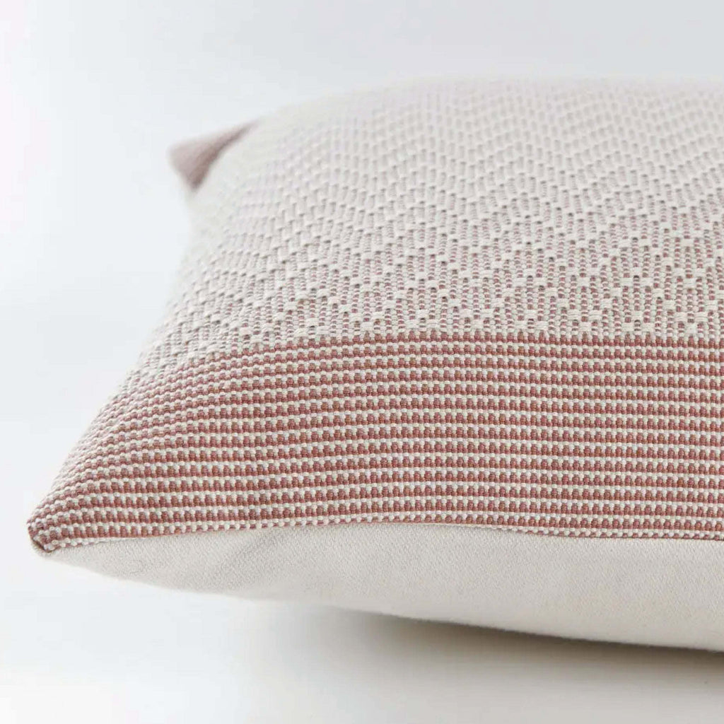 Rose Pink Chevron Cushion with raised embroidery detail.