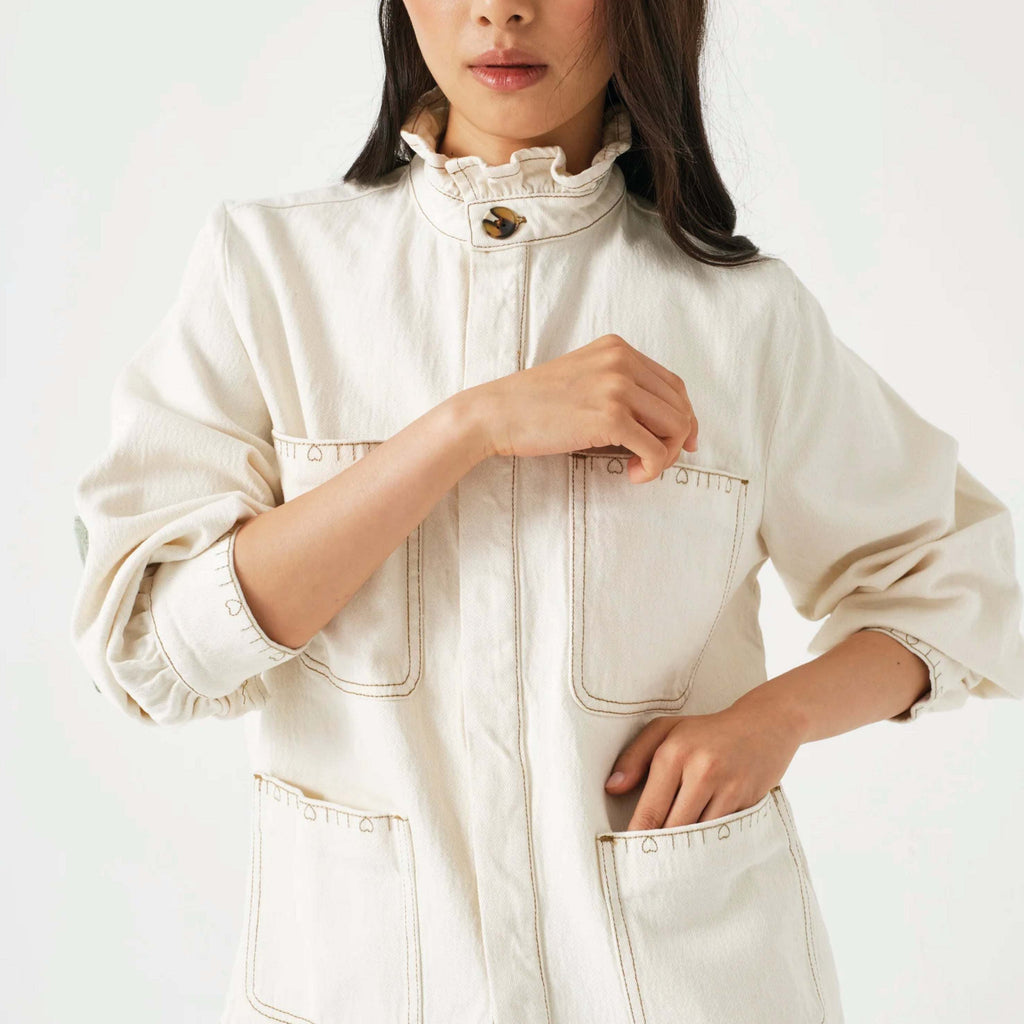 Seventy + Mochi Ecru Dear Pablo Jacket with embroidered floral details and frill collar.