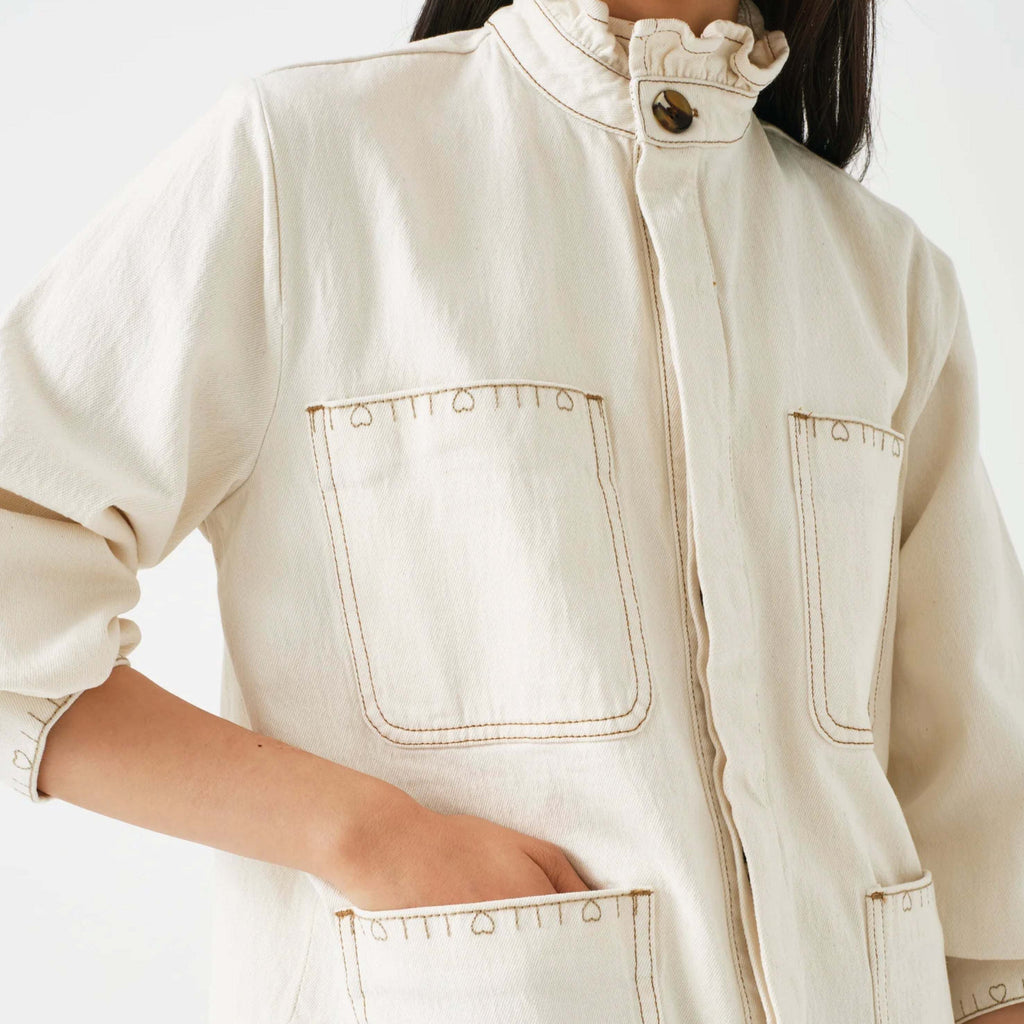 Seventy + Mochi Ecru Dear Pablo Jacket with embroidered floral details and frill collar.