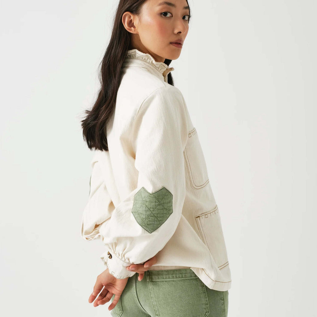 Seventy + Mochi Ecru Dear Pablo Jacket with floral embroidery and frill collar, featuring a relaxed fit and eco-friendly materials.