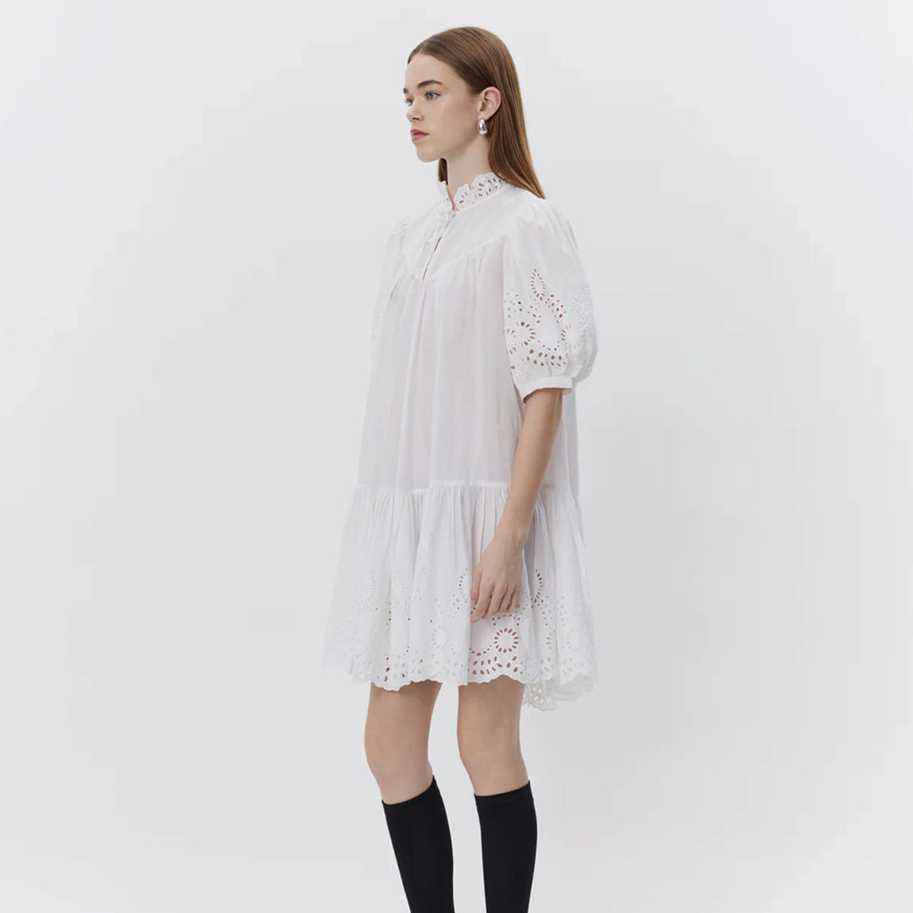 Sofie Schnoor Sibba Snow White Dress with pointelle embroidery, ruffle collar, and short puff sleeves. 
Sofie Schnoor Sibba Snow White Dress - Jo And Co Sofie Schnoor Sibba Snow White Dress - Sofie Schnoor