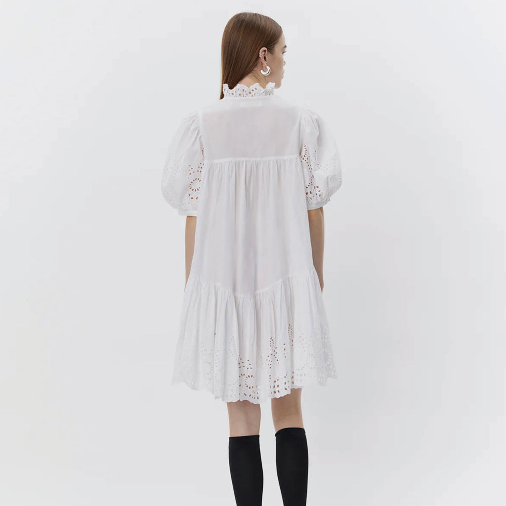 Sofie Schnoor Sibba Snow White Dress with pointelle embroidery, ruffle collar, and short puff sleeves. 
Sofie Schnoor Sibba Snow White Dress - Jo And Co Sofie Schnoor Sibba Snow White Dress - Sofie Schnoor