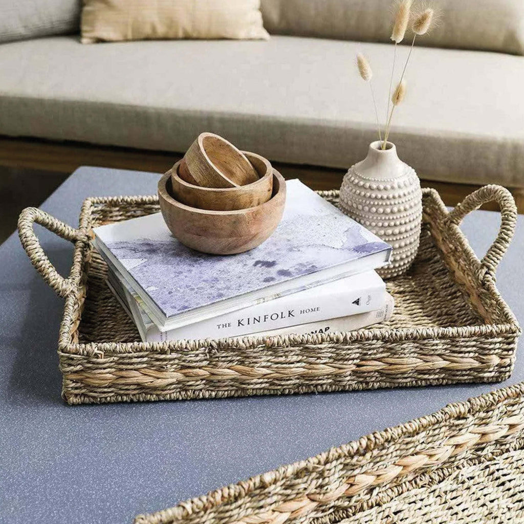 Small Natural Woven Bayford Tray made from seagrass and water hyacinth on table.