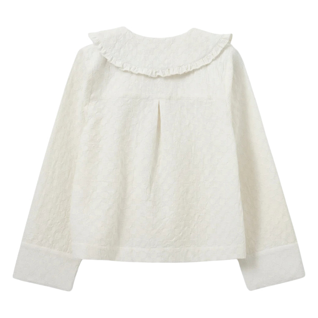 Sofie Schnoor Snow White Hannah Shirt with ruffled Peter Pan collar and tie closure.
Sofie Schnoor Snow White Hannah Shirt - Jo And Co Sofie Schnoor Snow White Hannah Shirt - Sofie Schnoor