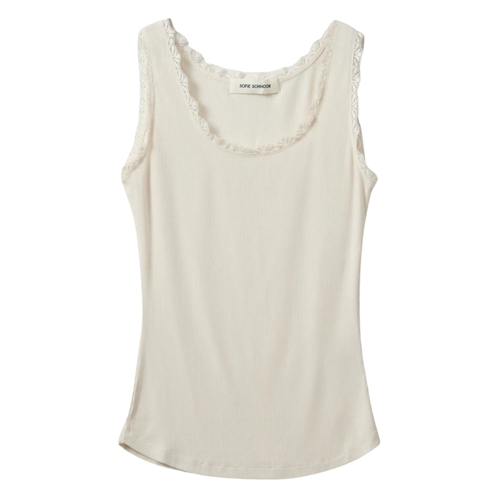 White Ulrikke Vest Top by Sofie Schnoor with lace details, slim-fit design, off white color.
Sofie Schnoor Off White Ulrikke Vest Top - Jo And Co Sofie Schnoor Off White Ulrikke Vest Top - Sofie Schnoor