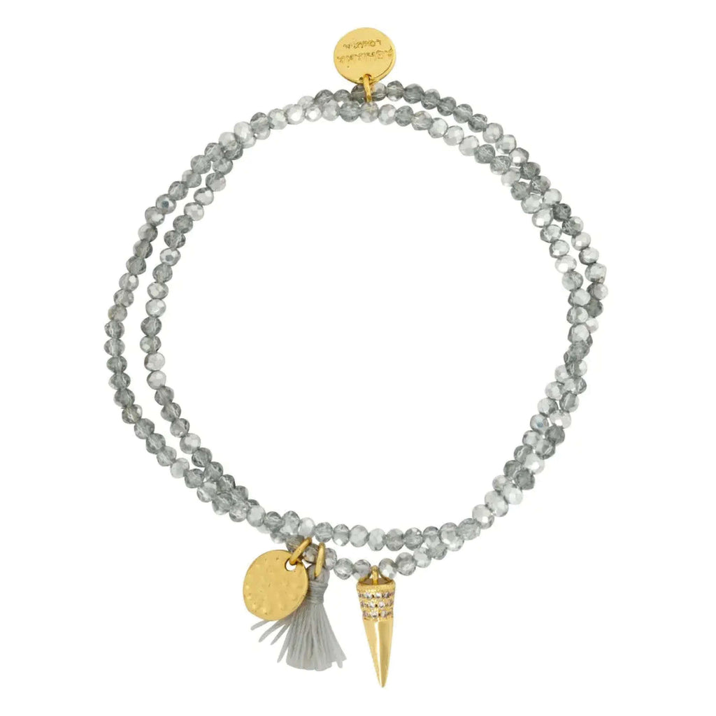 Ashiana London Spark Grey Bracelet set with crystal beads, gold spike charm, and tassel.