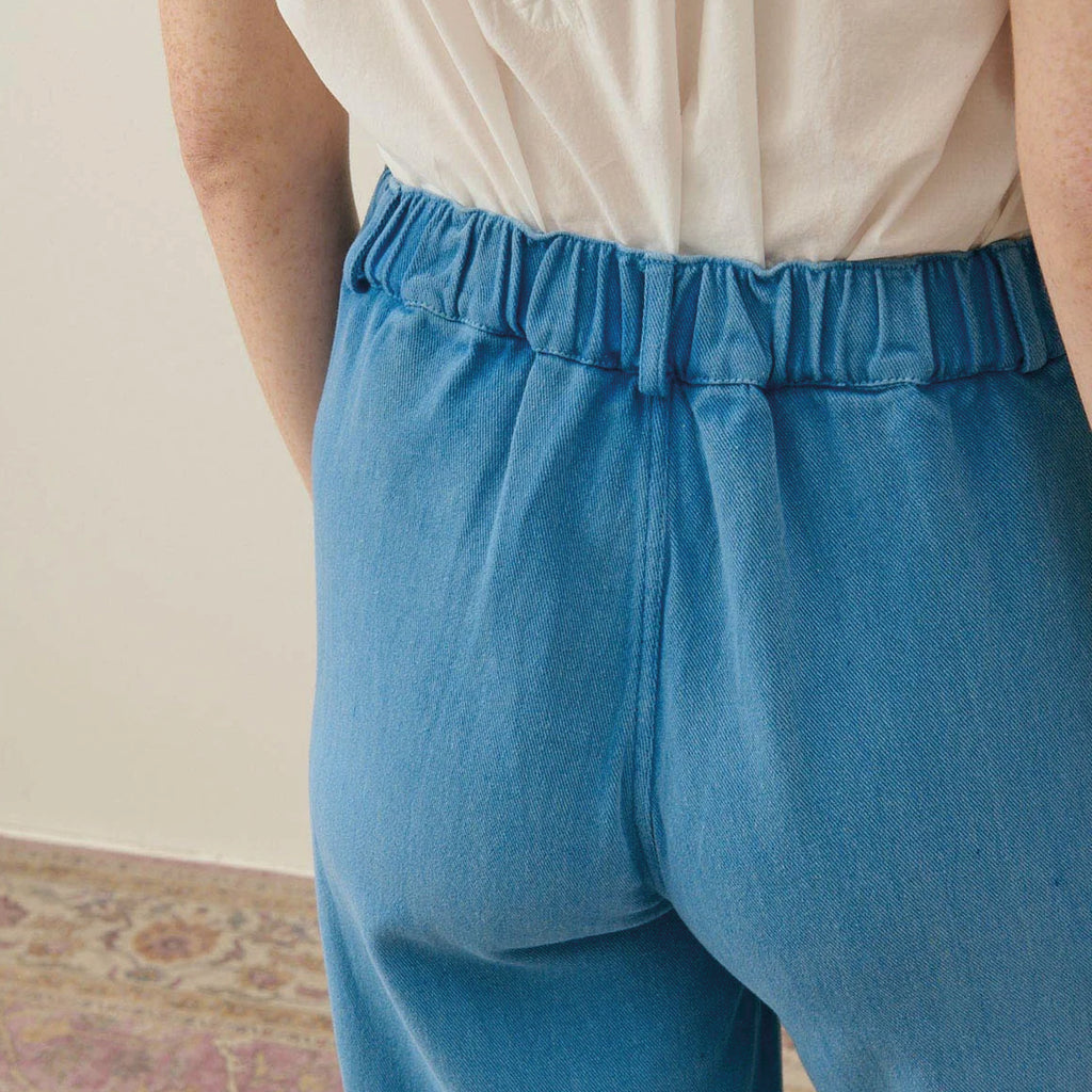 Straight cut blue cotton trousers with front patch pockets with slant opening and rickrack edges.
Louise Misha Stone Blue Florette Trousers - Jo And Co Louise Misha Stone Blue Florette Trousers - Louise Misha