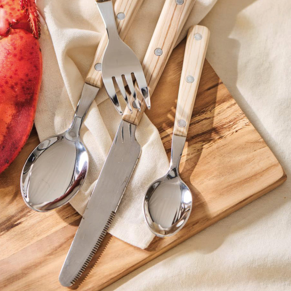 16-piece cutlery set in stainless steel with plastic handles in wood effect with silver rivets.
Valdemar Cutlery Set - Jo And Co Valdemar Cutlery Set