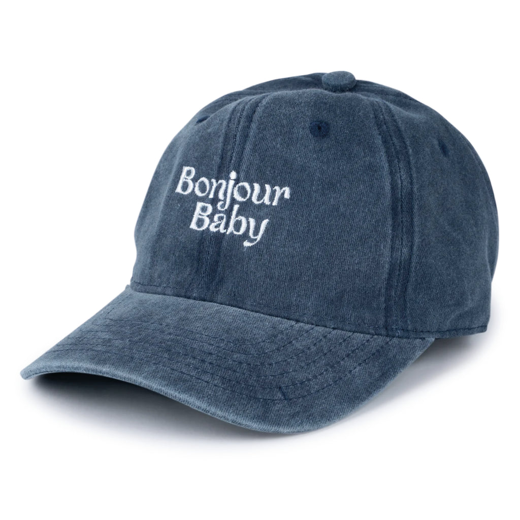 Cap in washed blue colour with "Bonjour Baby" embroidery on the front.
Washed Blue Everyday Cap - Jo And Co Washed Blue Everyday Cap - SUI AVA