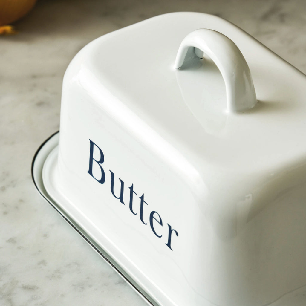 White enamel butter dish with ink detail and "Butter" lettering.
White Butter Dish - Jo And Co White Butter Dish