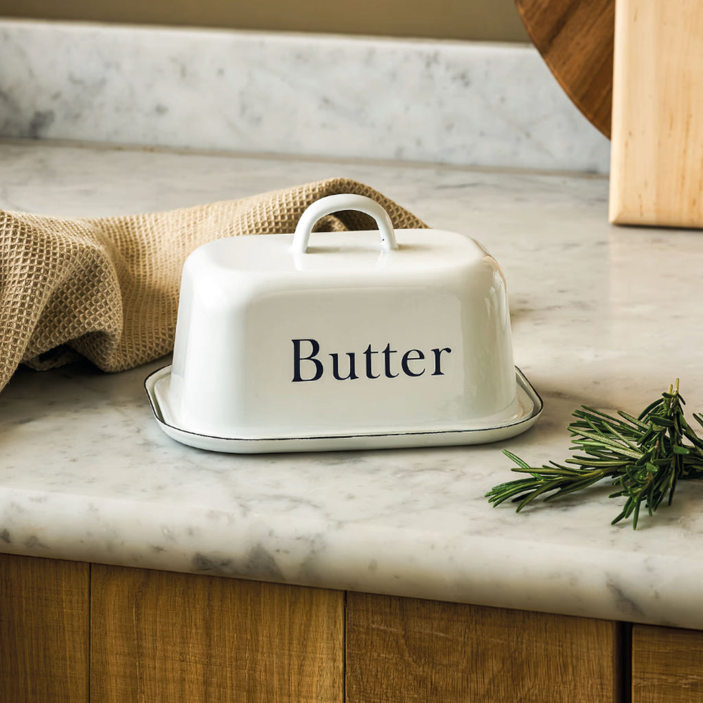 White enamel butter dish with ink detail and "Butter" lettering.
White Butter Dish - Jo And Co White Butter Dish